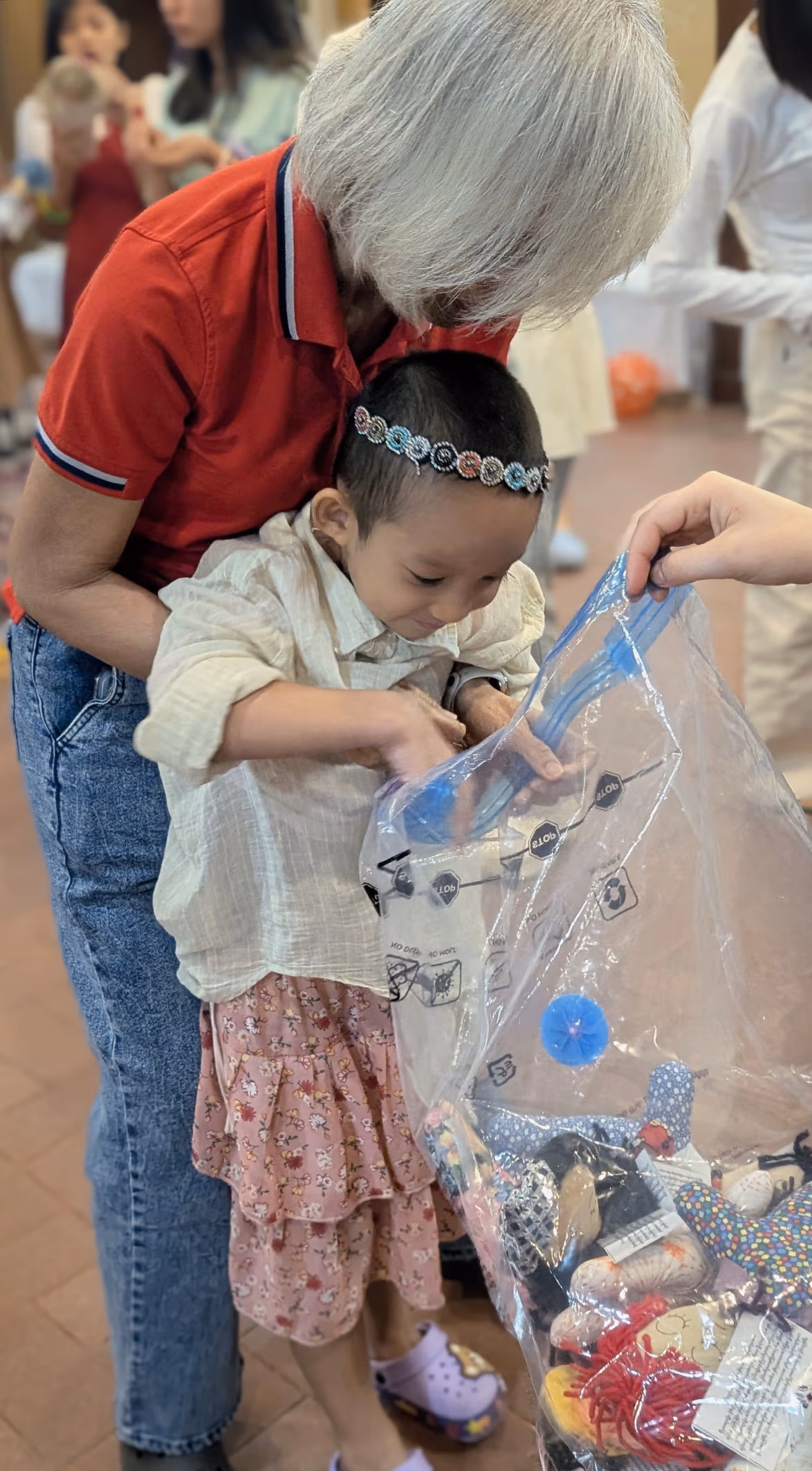 Even the youngest girls receive their dolls